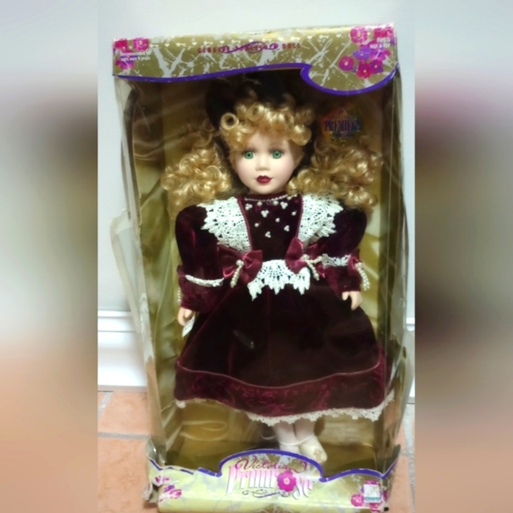 Vintage porcelain doll. Premiere Collection By Claire Joy.
